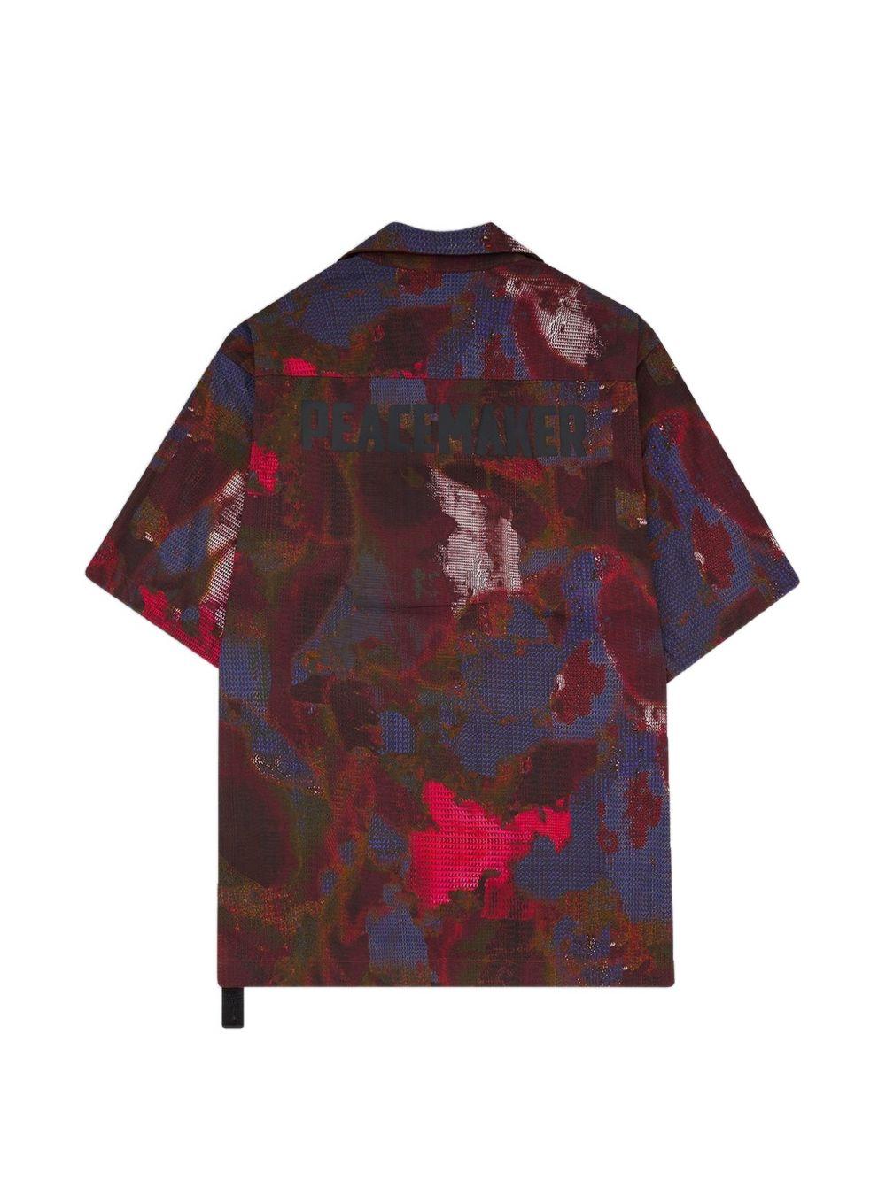 Camicia con stampa all-over in rosso e multicolore Oamc peacemaker - uomo 