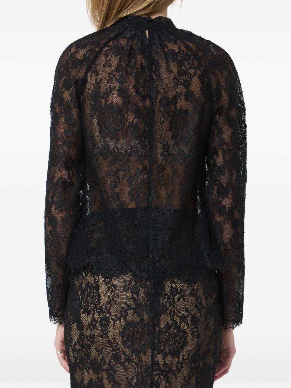 Blusa in pizzo in nero 