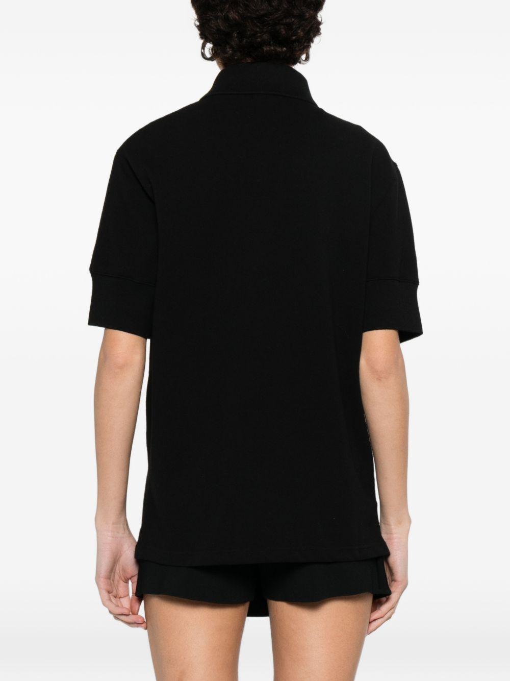 T-shirt polo con logo e toppa in nero Courrèges - donna 
