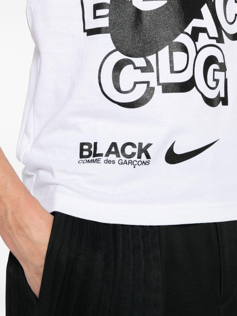 T-shirt con stampa in bianco e nero  Comme Des Garçons Black  x Nike - unisex 