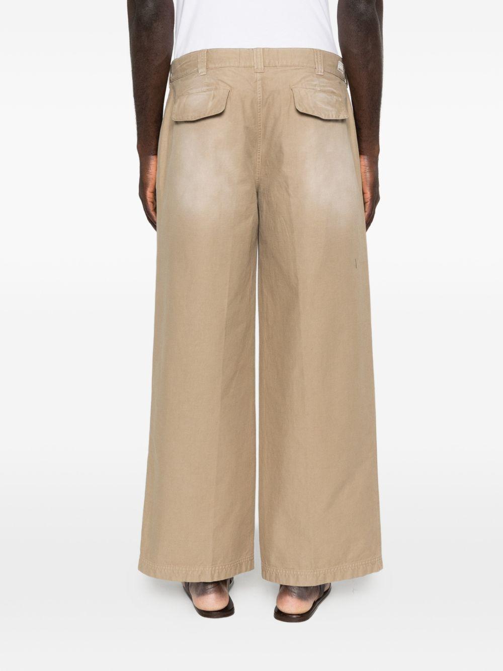 Pantaloni con passanti per cintura in beige Erl - unisex 