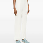 Pantaloni con pieghe in bianco Issey miyake  - donna 