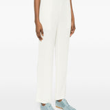 Pantaloni con pieghe in bianco Issey miyake  - donna 