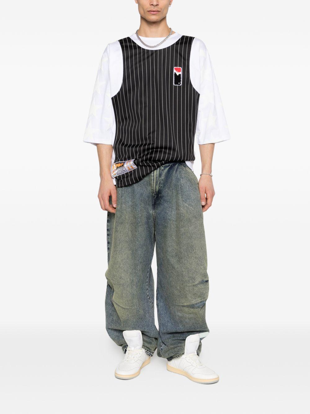 Jeans con pieghe in blu Pdf - uomo 