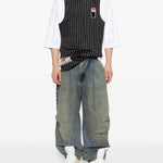Jeans con pieghe in blu Pdf - uomo 