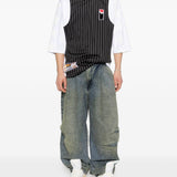 Jeans con pieghe in blu Pdf - uomo 