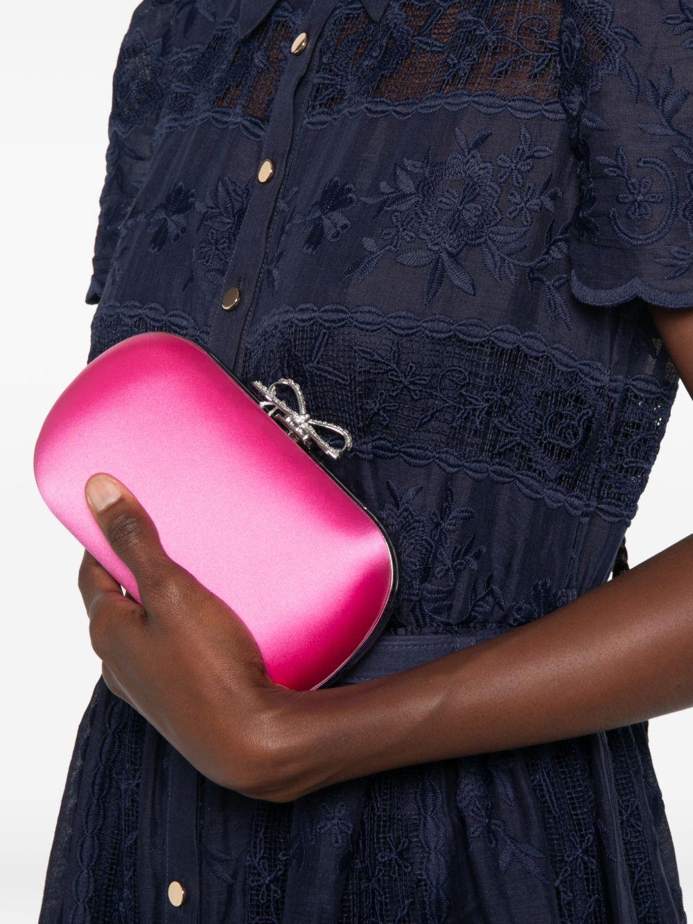 Clutch in raso con fiocco in rosa 