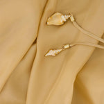 Abito lungo con cut-out Mahon in beige 