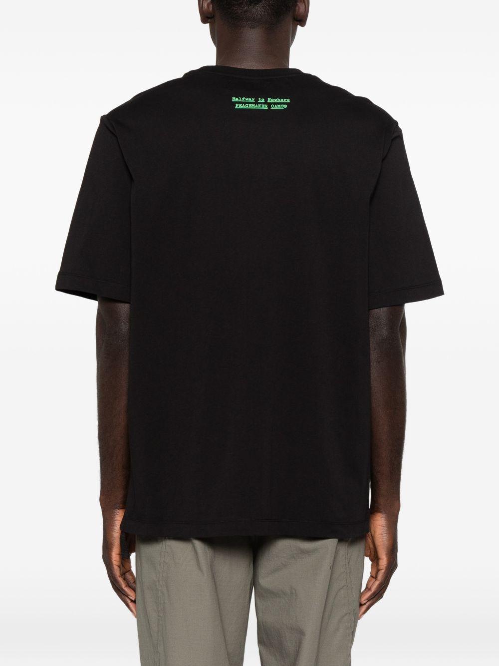 T-shirt con stampa grafica in nero Oamc peacemaker - uomo 