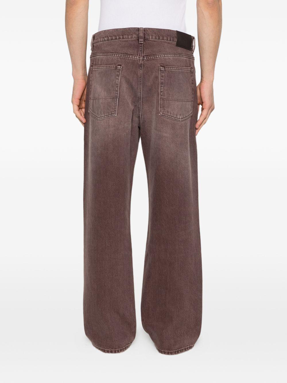Jeans con effetto schiarito in marrone Our legacy - uomo 
