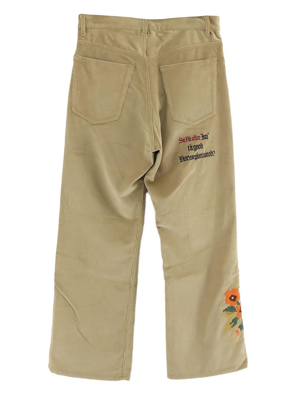 Pantaloni con ricamo floreale in beige Khoki - uomo 