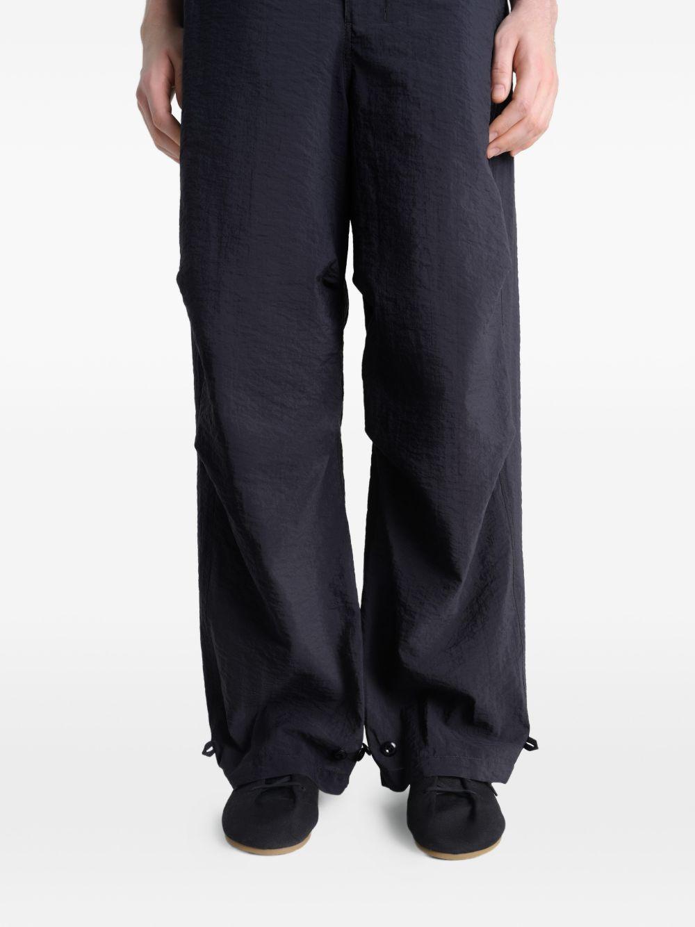 Pantaloni con tasche in nero LEMAIRE - uomo 