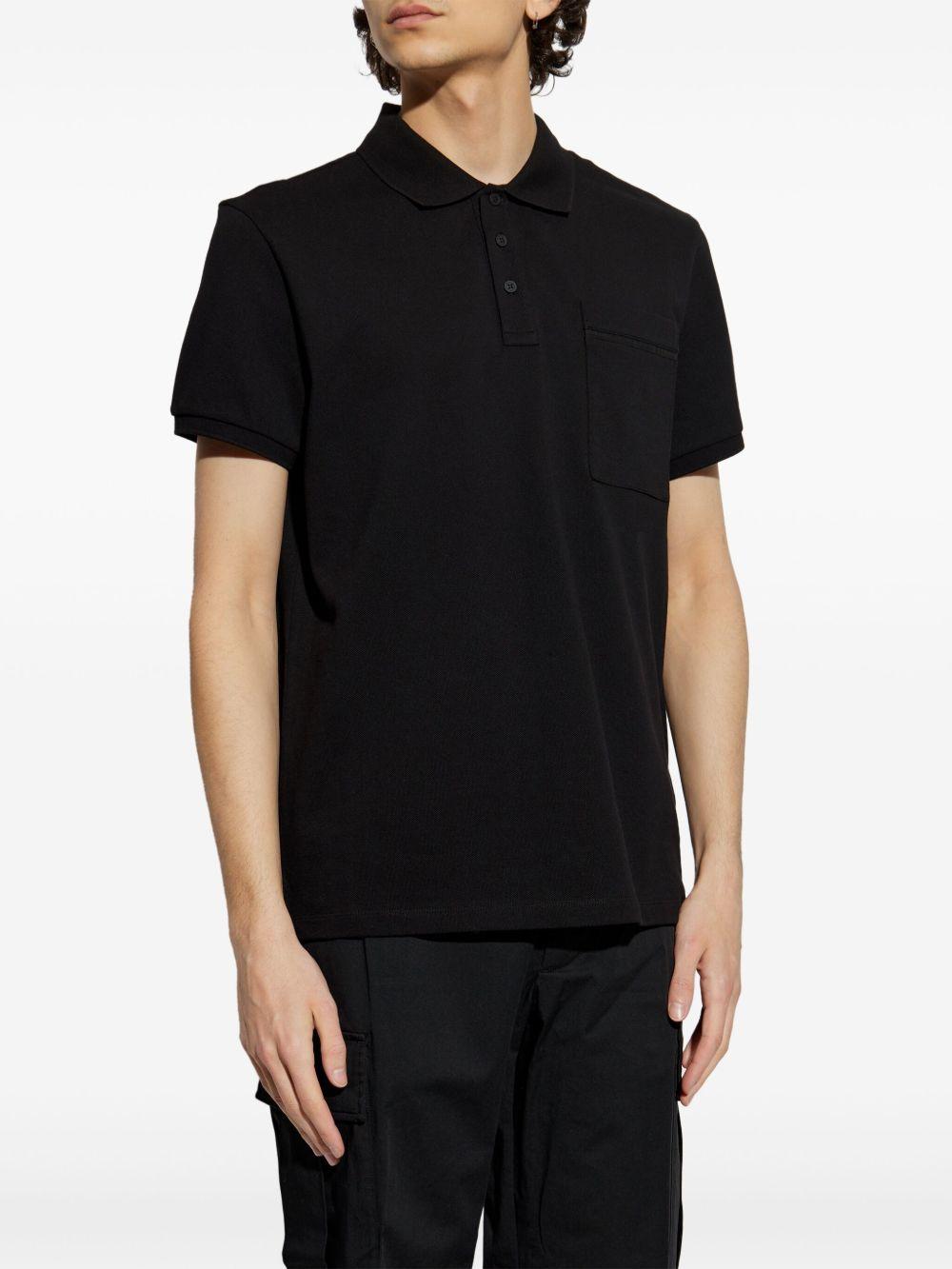 Polo con applicazione logo in nero Moncler - uomo 