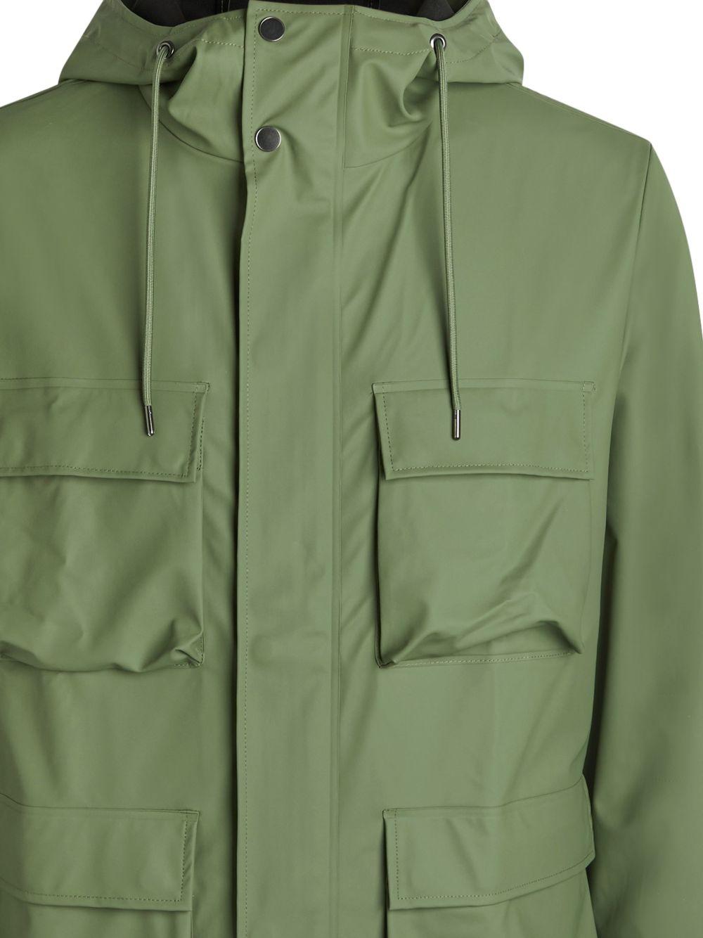 Giacca con cappuccio in verde Rains - unisex 