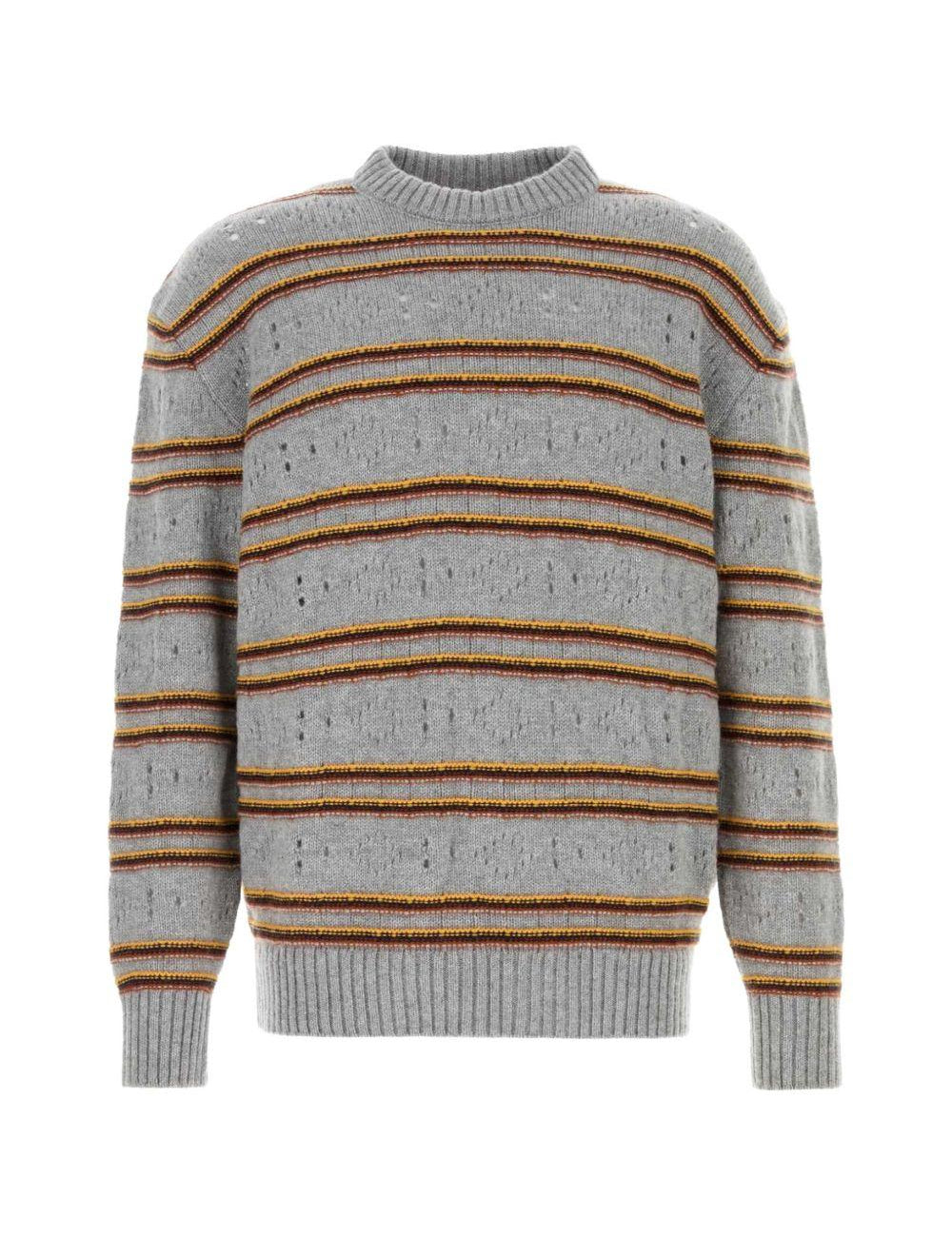 Maglione in cashmere a righe in grigio 