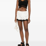 Top con rifinitura in pizzo in nero Simone rocha - donna 