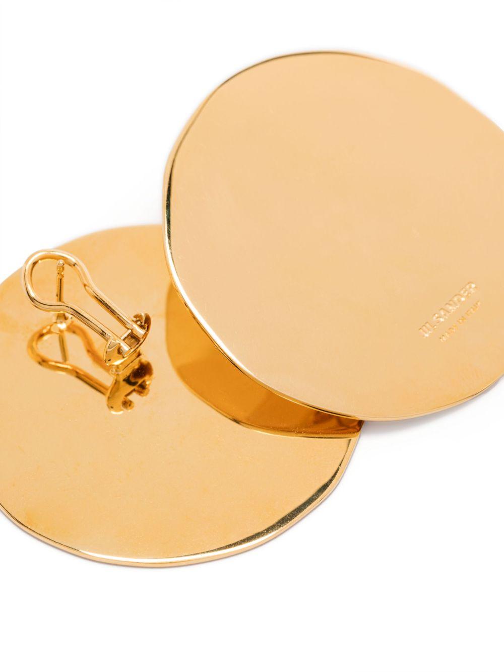 Orecchini rotondi con logo in oro Jil Sander - donna 