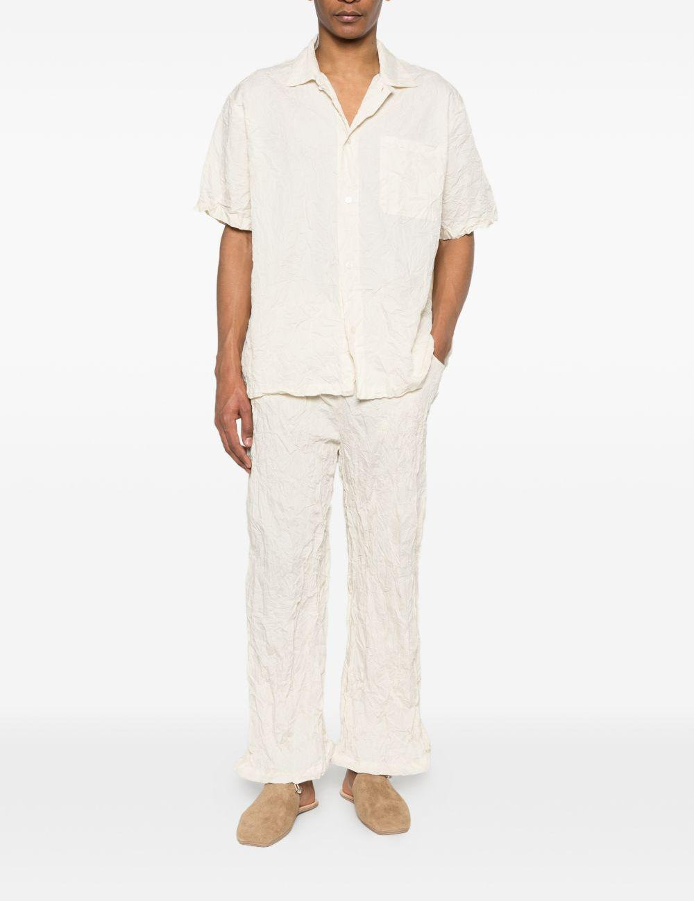 Pantaloni con vita elasticizzata in bianco Gongdid design - uomo 