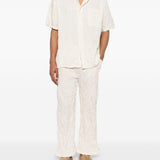 Pantaloni con vita elasticizzata in bianco Gongdid design - uomo 