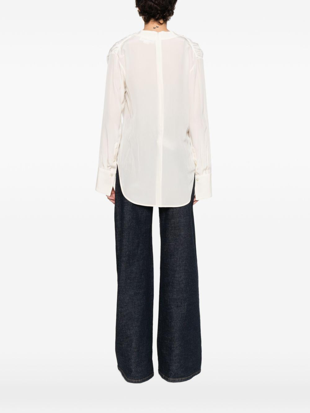 Blusa con dettaglio polsino in bianco Victoria beckham - donna 