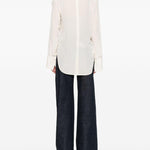Blusa con dettaglio polsino in bianco Victoria beckham - donna 