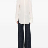 Blusa con dettaglio polsino in bianco Victoria beckham - donna 