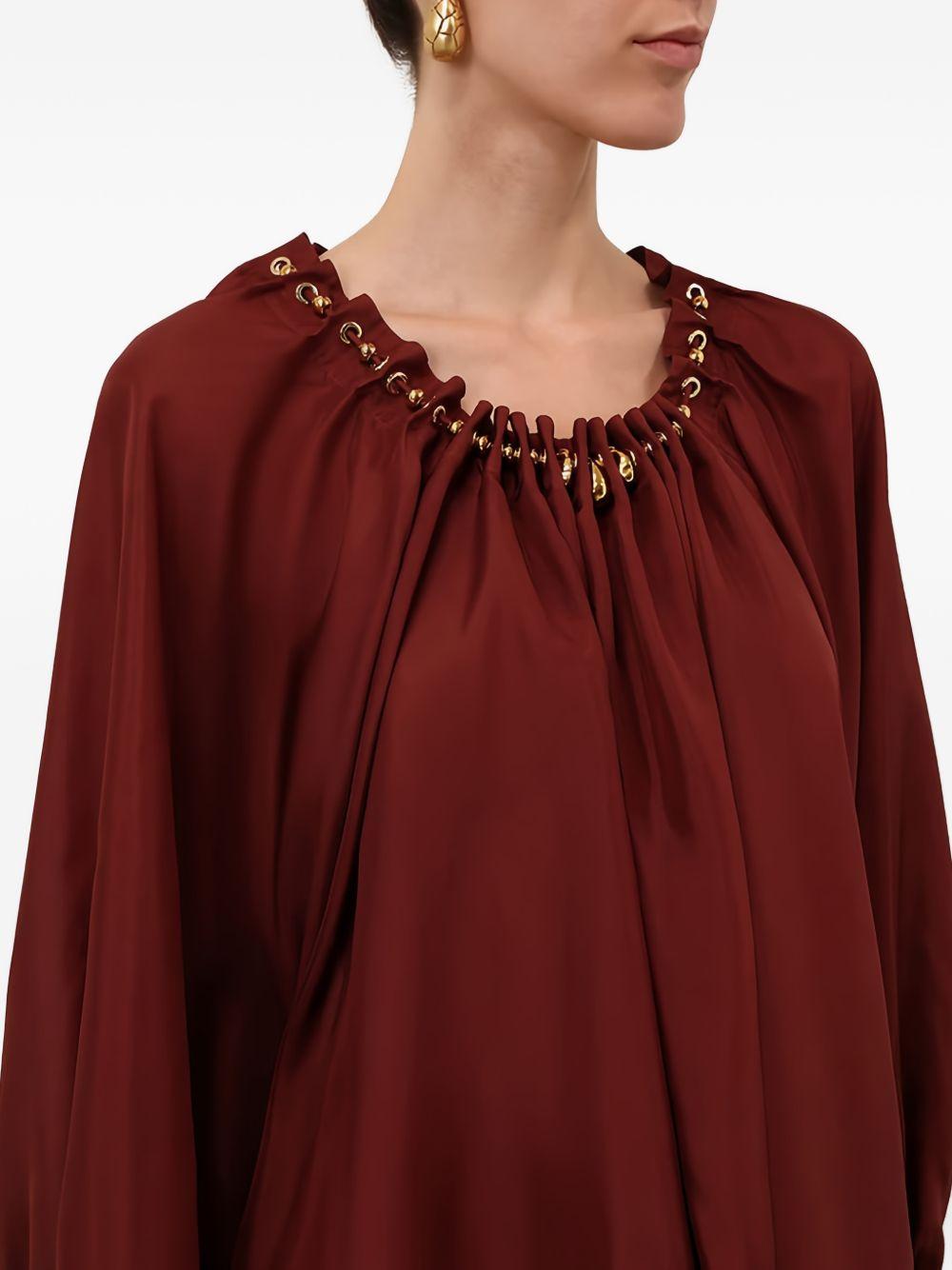 Blusa con decorazioni di perline Aster in bordeaux 
