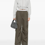 Pantaloni con cintura a doppio strato e logo in verde Alexander wang - donna 