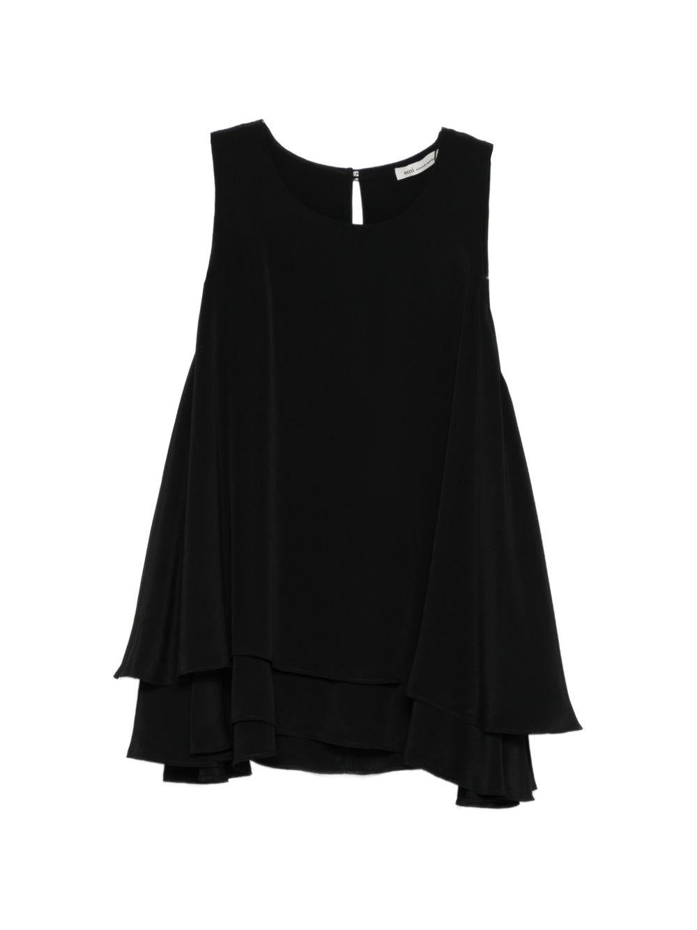 Top con ruchesi in nero 