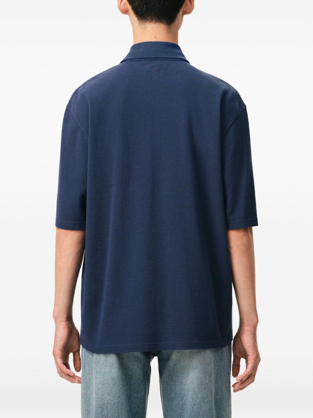Polo Ami de Coeur con applicazione in blu Ami paris - uomo 