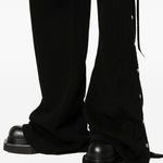Pantaloni flared con coulisse in nero Rick owens drkshdw - uomo 