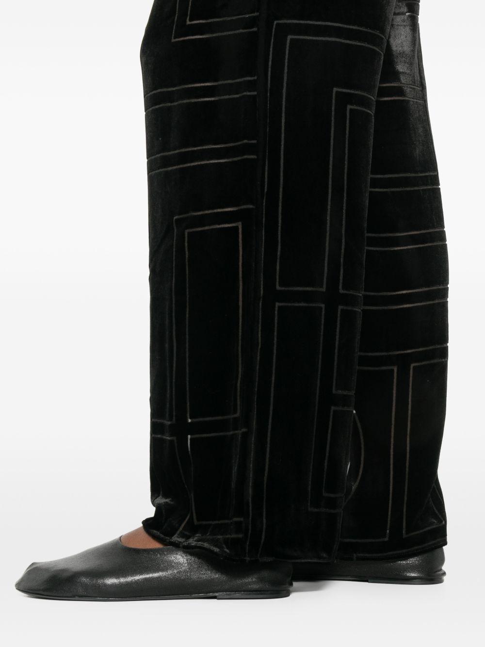 Pantaloni da pigiama monogram devoré in nero Toteme - donna 