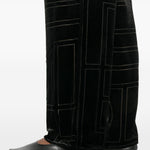 Pantaloni da pigiama monogram devoré in nero Toteme - donna 