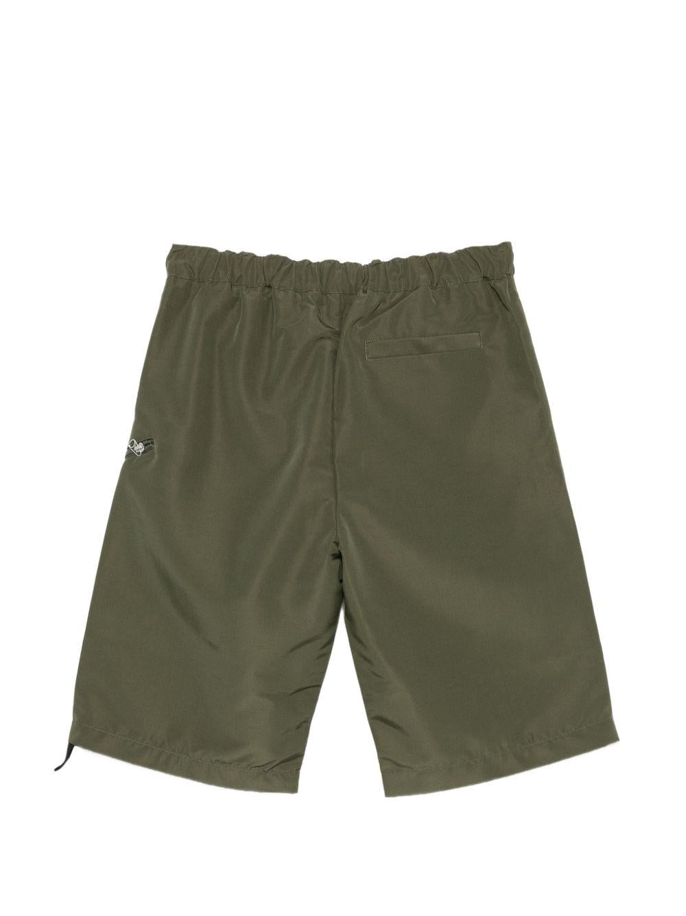 Pantaloncini con cintura in verde Oamc peacemaker - uomo 