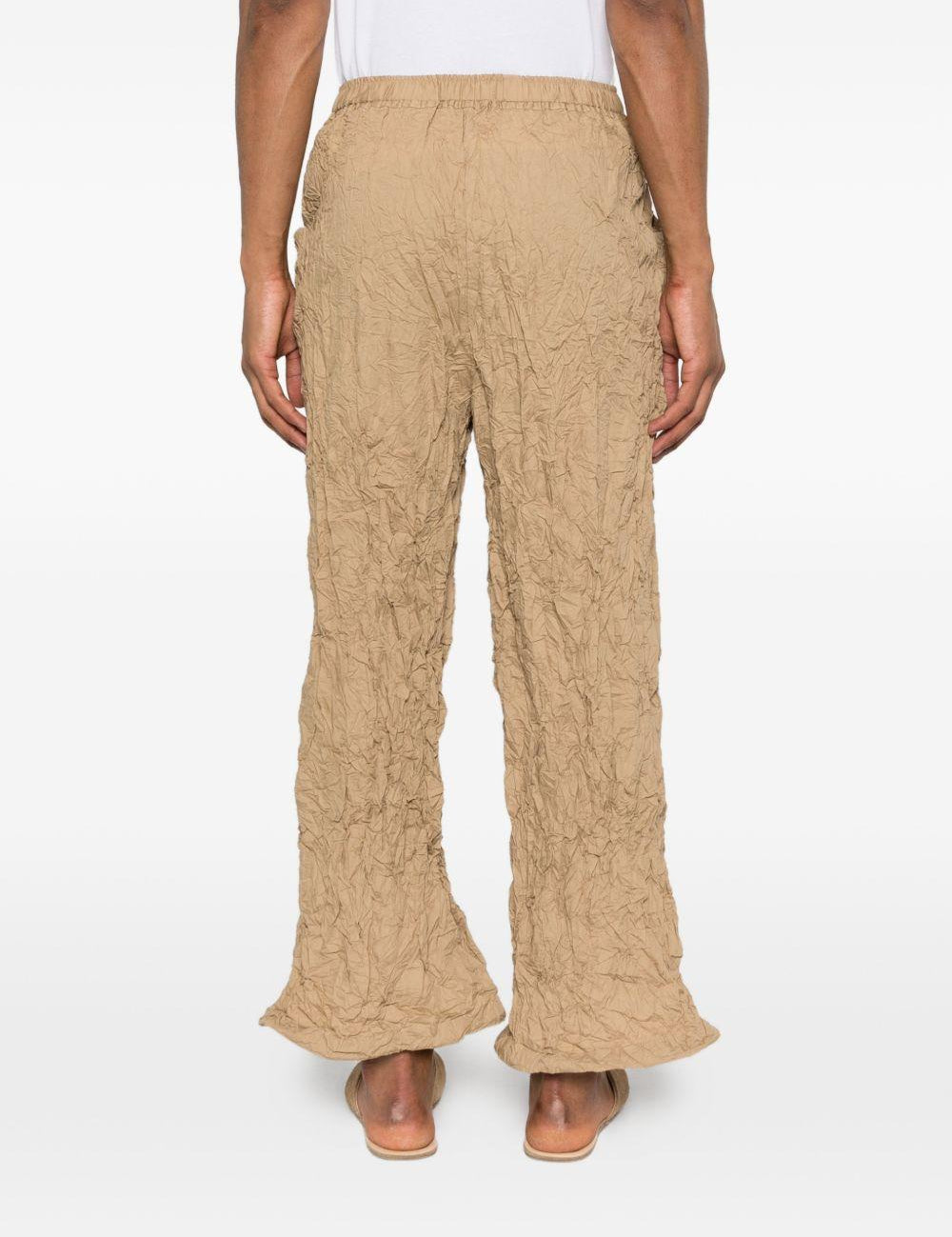 Pantaloni plissettati in beige gongdid design - donna 