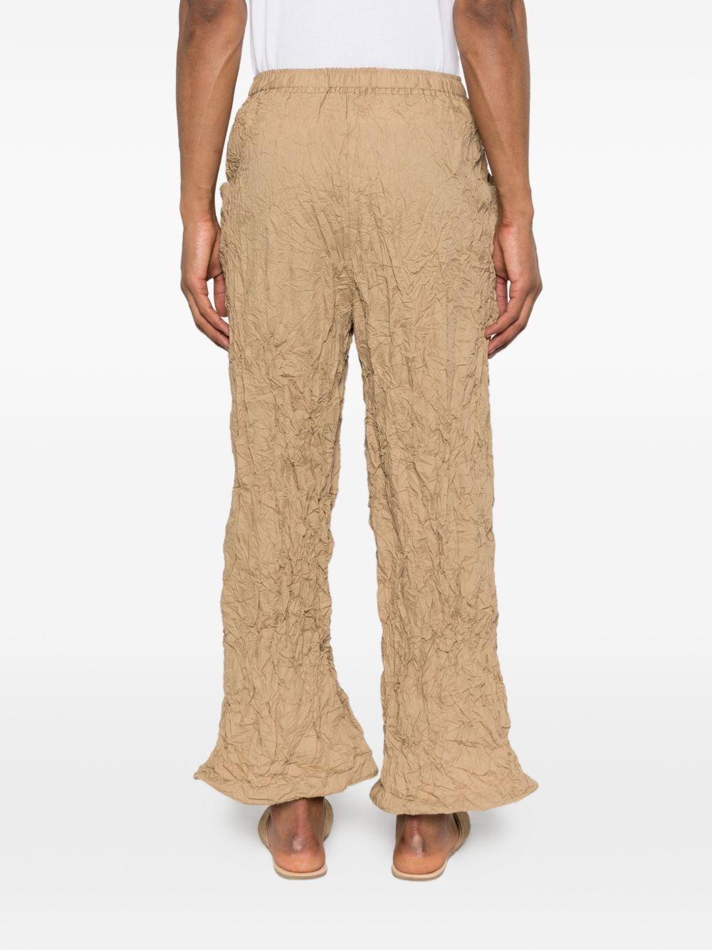 Pantaloni plissettati in beige gongdid design - donna 