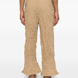 Pantaloni plissettati in beige gongdid design - donna 