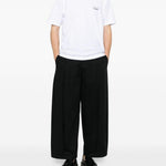 T-shirt con logo in bianco Comme des garcons homme - uomo 