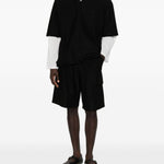 Pantaloncini cargo con coulisse in nero Comme des garcons homme - uomo 