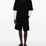 Pantaloncini cargo con coulisse in nero Comme des garcons homme - uomo 