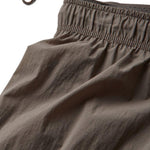 Shorts tecnici da running in beige 