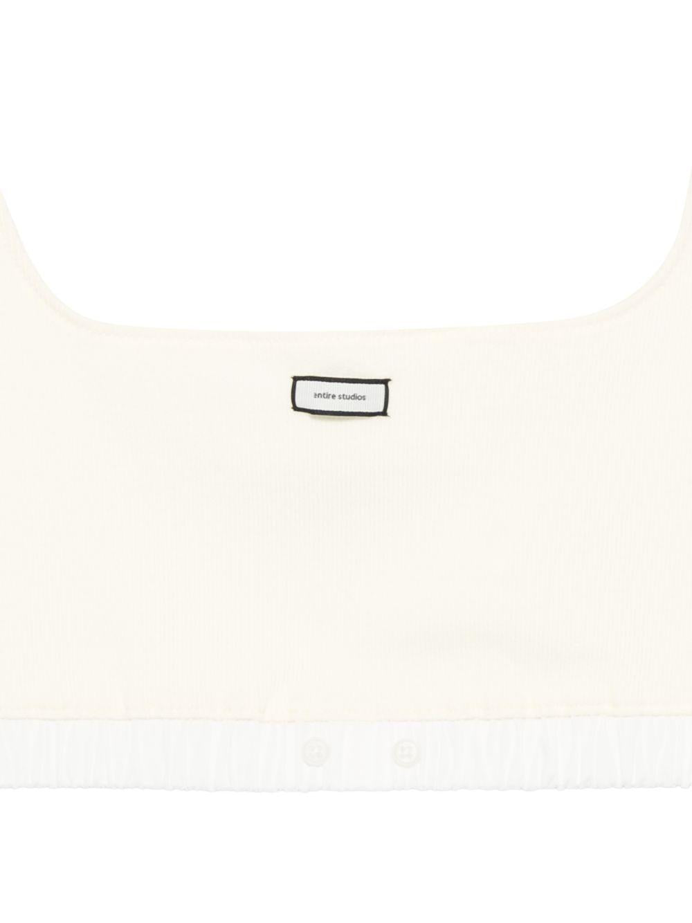Top crop con logo in bianco Entire studios - donna 