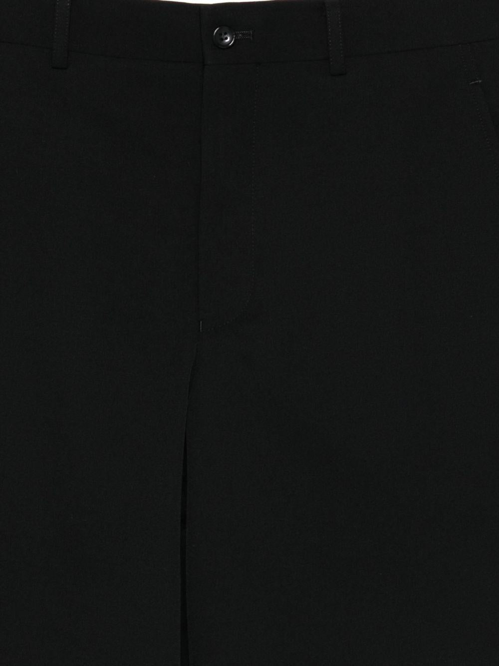Pantaloni corti con bottoni in nero Comme des Garçons Homme Plus - uomo 