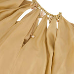 Abito lungo con cut-out Mahon in beige 
