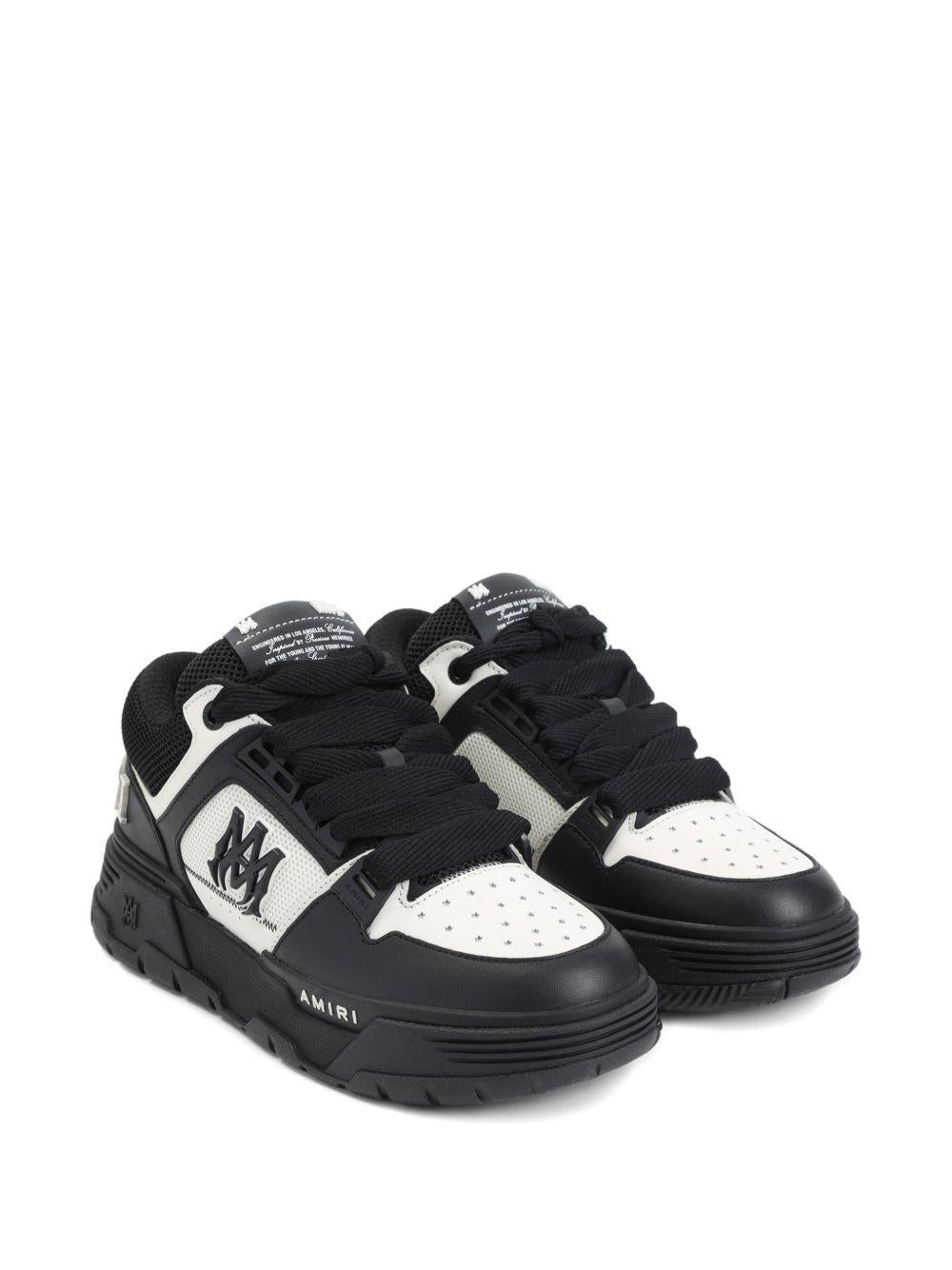 Sneakers con logo in nero Amiri - uomo 
