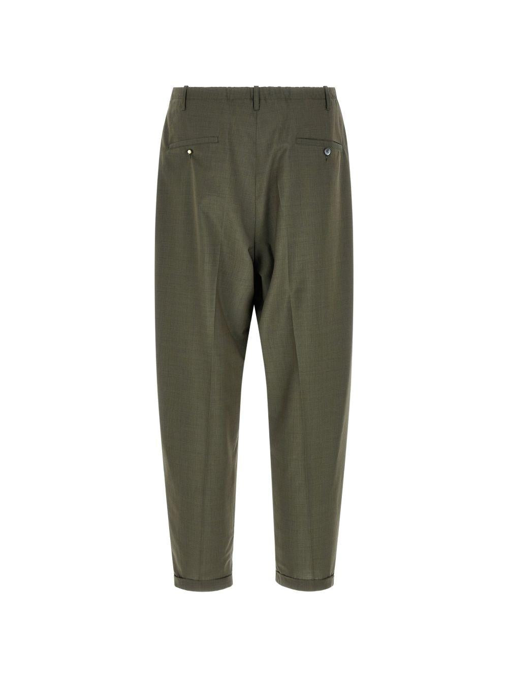Pantaloni affusolati con elastico in vita in verde Magliano - uomo 