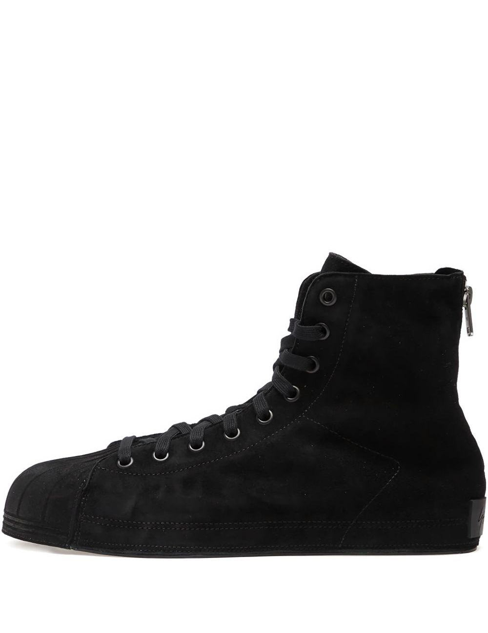 Sneakers con lacci e zip in nero 