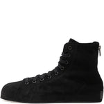 Sneakers con lacci e zip in nero 