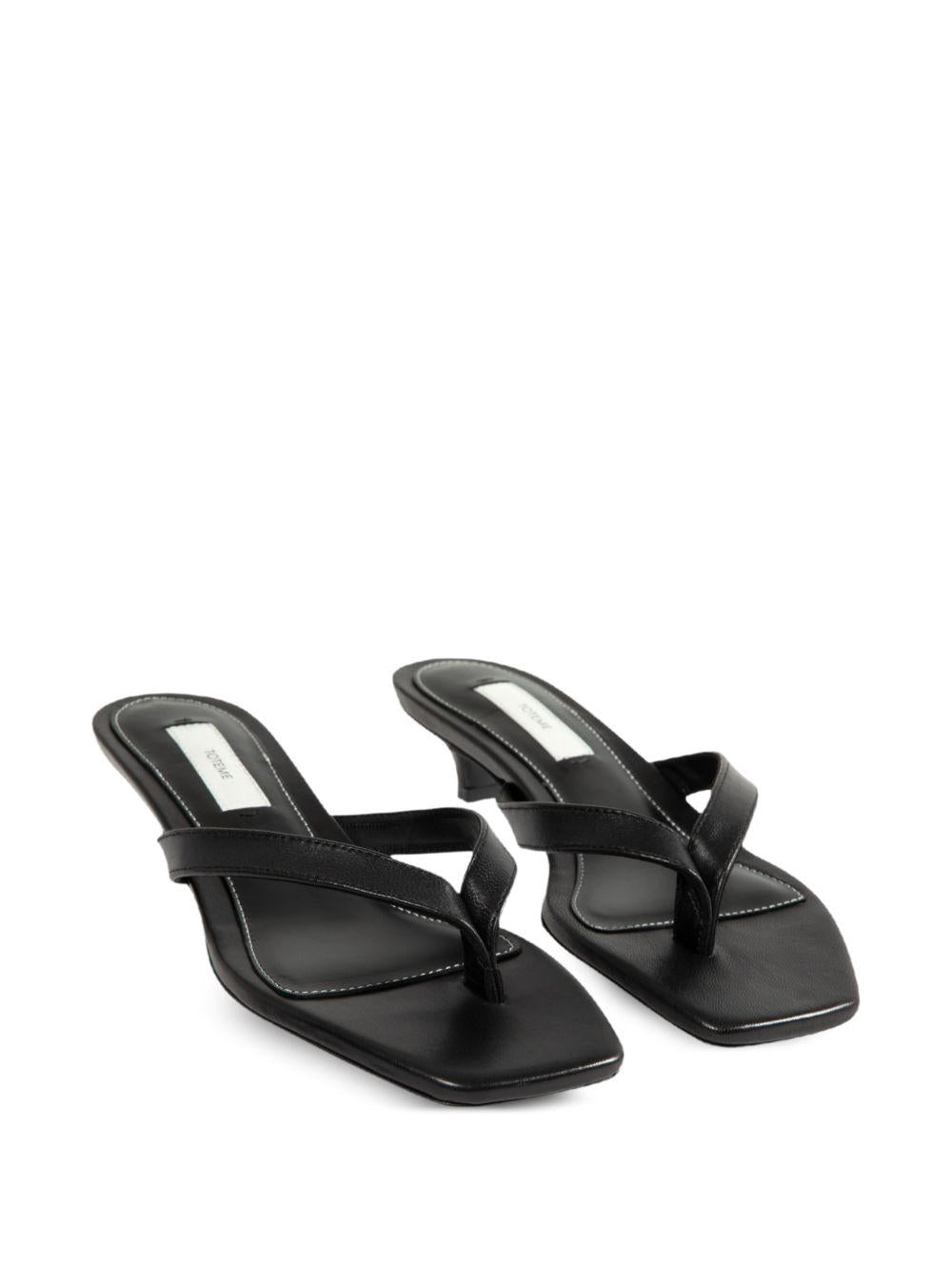 Sandali infradito in nappa in nero 