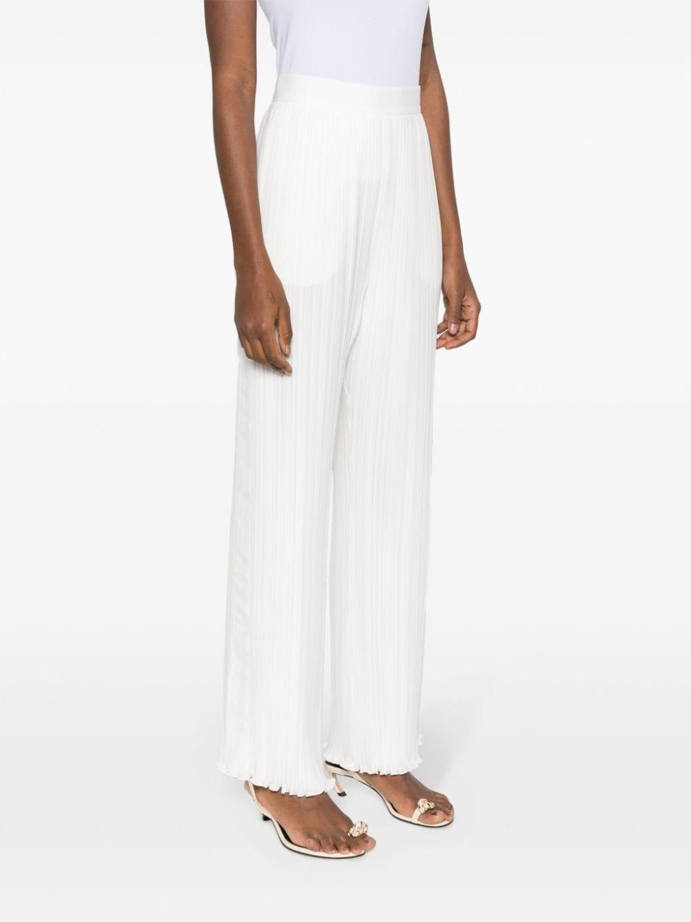 Pantaloni dritti con pieghe in bianco - donna 